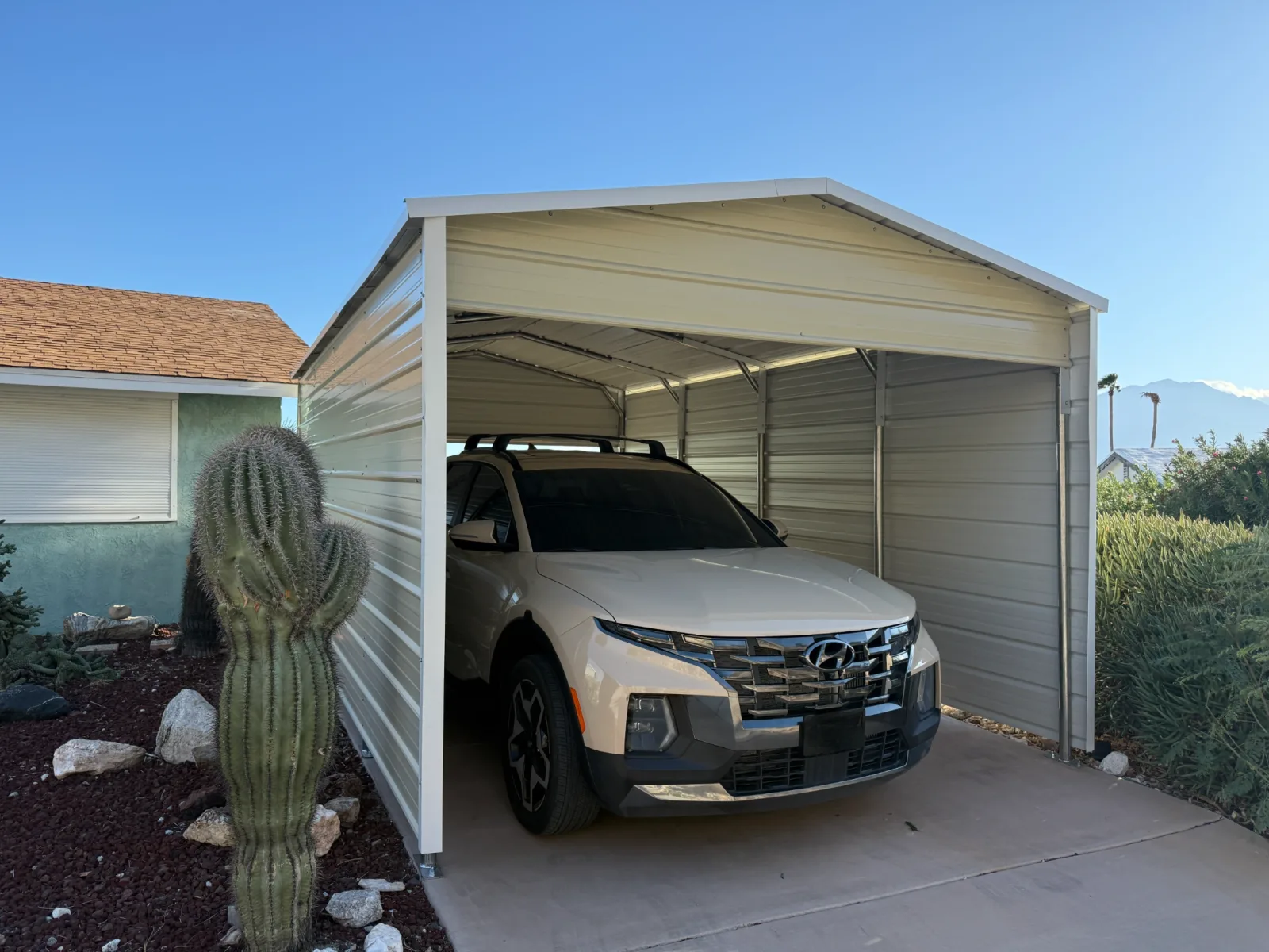 Boxed-eve steel carport